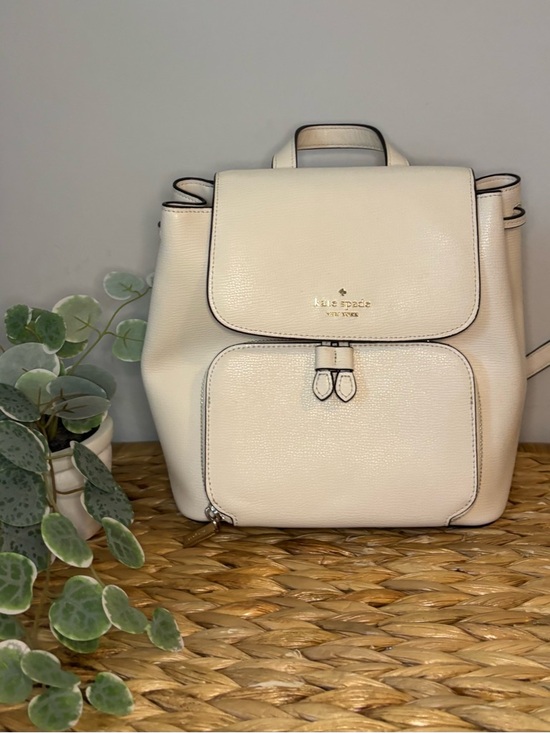 kate spade Handbags - kate spade Cream Pebbled Leather Backpack with Front Pocket